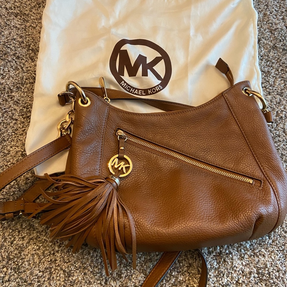 Michael Kors brown bag can be used crossbody or used with small handle